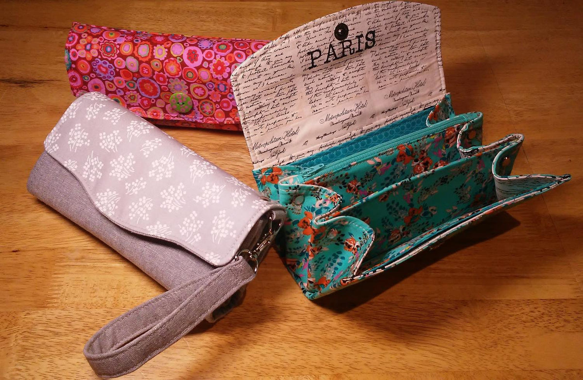 Necessary clutch wallet 2025